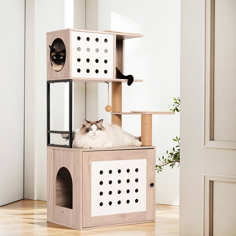 Arbre à chat d'intérieur comprenant un bac à litière gris et blanc, un grand couchage, un espace nourriture et des poteaux à griffer, dans une tour au style décoratif moderne pour animaux de compagnie.