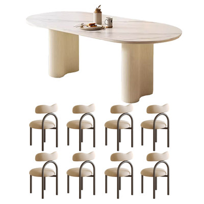 Table et chaises de salle à manger ovales de style crème