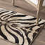 Tapis brun foncé / beige à imprimé animal Poway-23286550