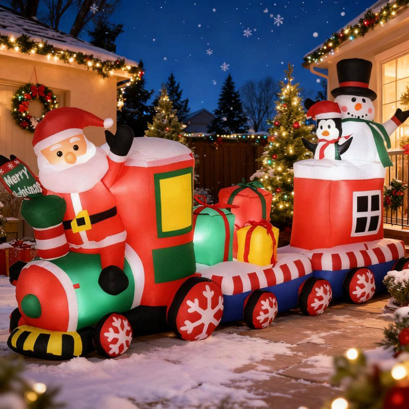 Train de Noël gonflable avec père Noël, bonhomme de neige et pingouin