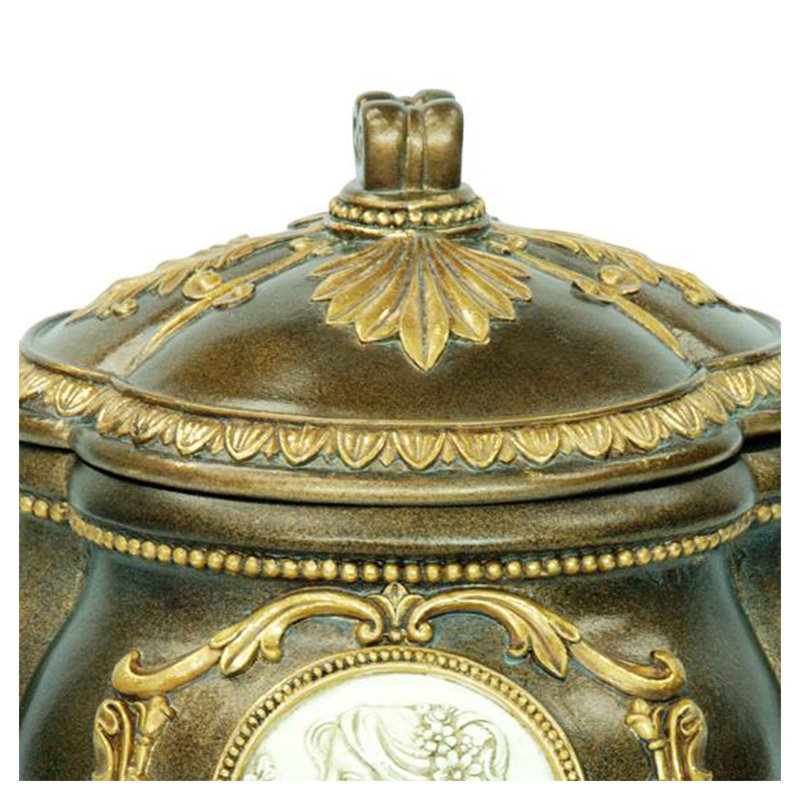 Boîte à bijoux décorative de 23 cm de haut avec des motifs grecs peints à la main, avec une finition bronze et or, en polyrésine.