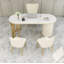 Bureau ovale moderne de luxe en pierre frittée avec tiroir crème et pieds dorés-933164163