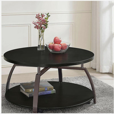 Deep grey and black nickel round coffee table