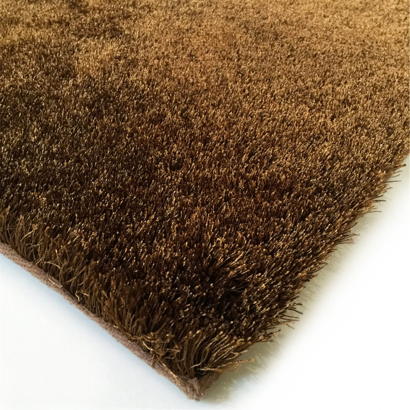 Tapis touffeté à la main