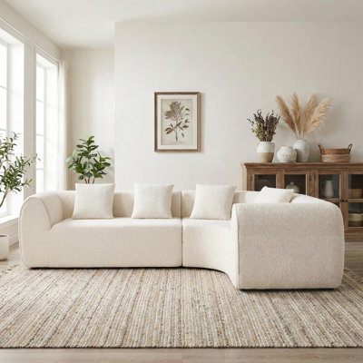 Canapé modulaire incurvé en forme de L avec coussins