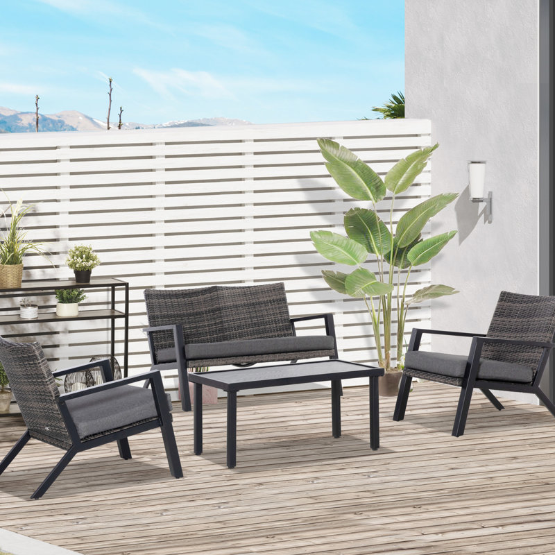 Mobilier de patio 4 pièces comprenant 2 chaises en PE et une table basse, idéale pour les rassemblements dans la cour