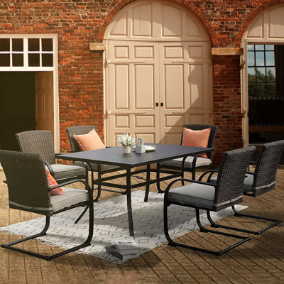 Gregoy 6 - Person Extendable Four Leg Dining Set