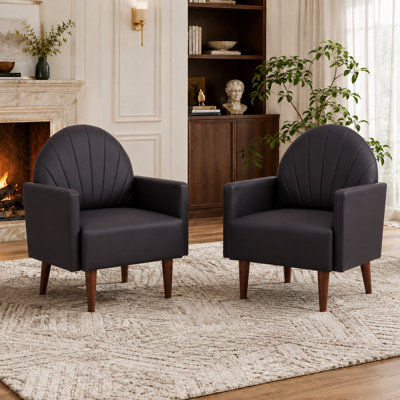 Un fauteuil contemporain en forme de coquille avec un revêtement en cuir de polyuréthane et des pieds en bois, adapté aux salons, aux balcons, aux chambres d'enfants et aux bureaux