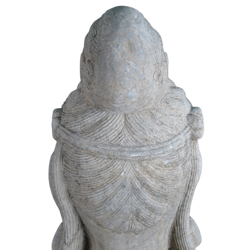 A Stone Statue Of Guanyin Head