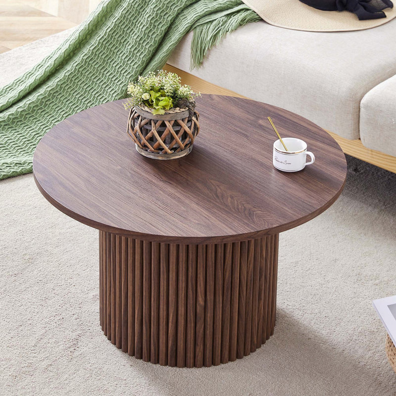 Table basse ronde avec pieds romains cylindriques et rangement caché - couleur noyer