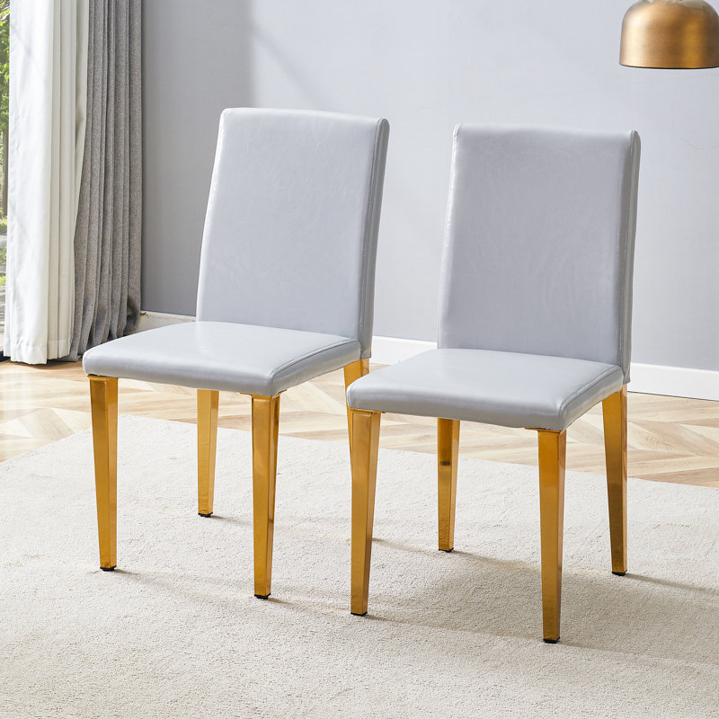 Ensemble de 2 chaises de salle à manger en polyuréthane gris clair avec pieds en métal doré, conception ergonomique pour la salle à manger et le bureau personnel. | Idée de cadeau