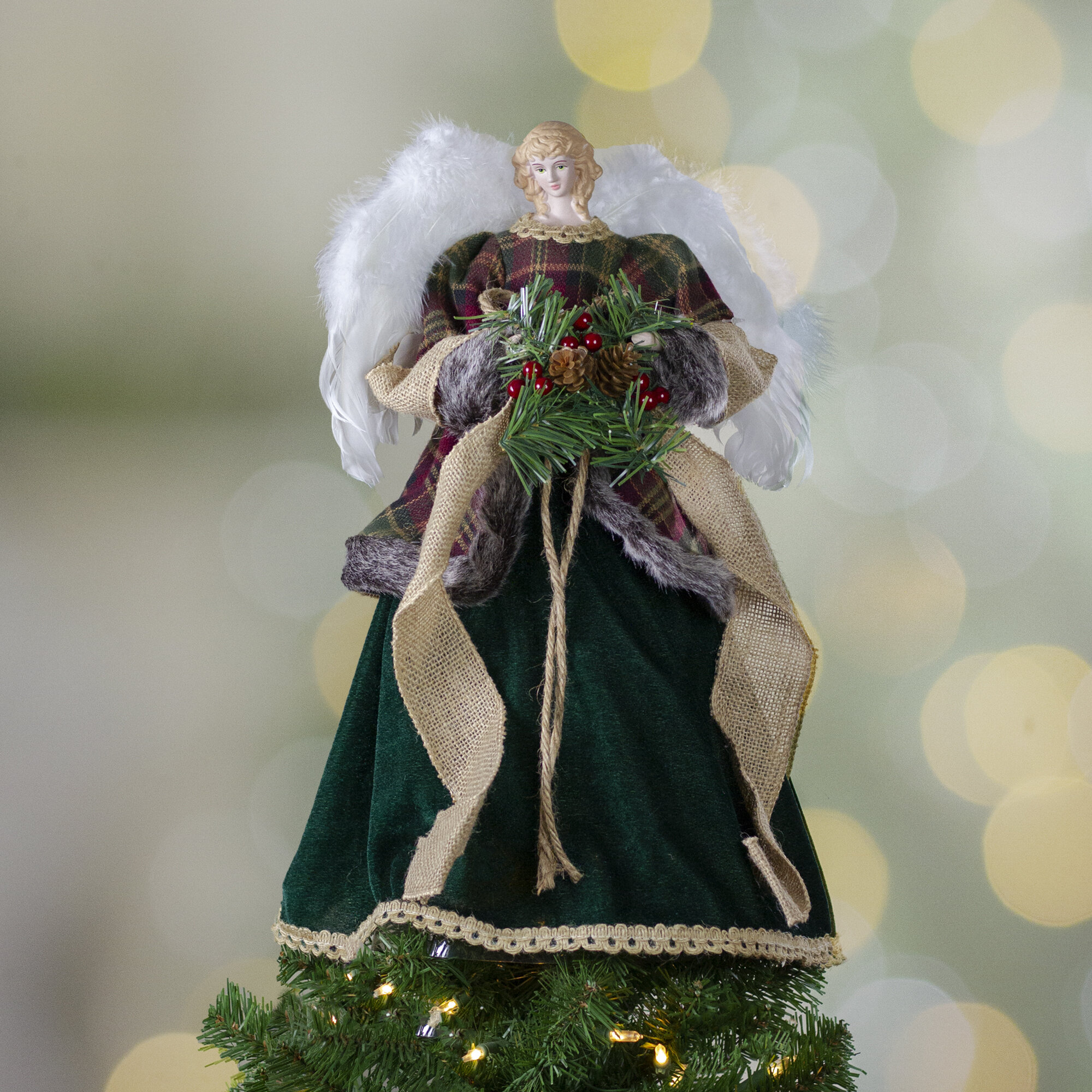 https://assets.wfcdn.com/im/26517551/compr-r85/1656/165666128/18-red-and-green-angel-in-a-dress-christmas-tree-topper-accented-with-holly-berries-unlit.jpg