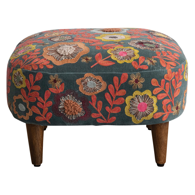 Tabouret en bois avec coussin en mousse
