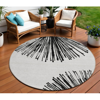 Tapis rond noir et ivoire 8 po