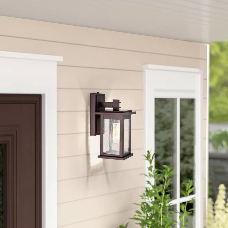 Ledbetter 12.25" H Seeded Glass Outdoor Wall Lantern with Dusk to Dawn, Oil Rubbed Bronze