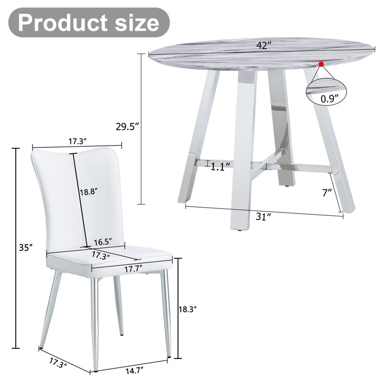 Ensemble de table et de chaises. Ensemble de table de salle à manger moderne en bois aggloméré de 42 po de diamètre - 4 chaises en polyuréthane avec un motif à rayures verticales sur le dossier. Bureau imitation marbre avec pieds en acier inoxydable.