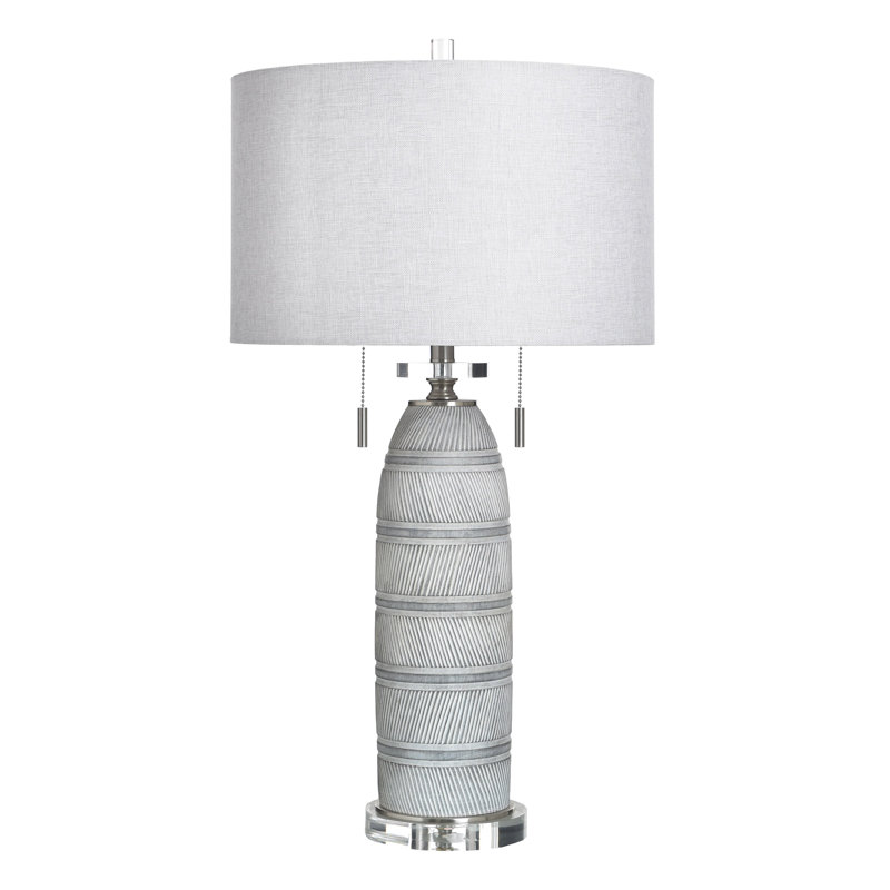 Lampe de table en pierre tissée