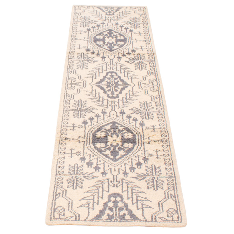 Tapis unique ivoire 2 pi 7 po x 8 pi 10 po