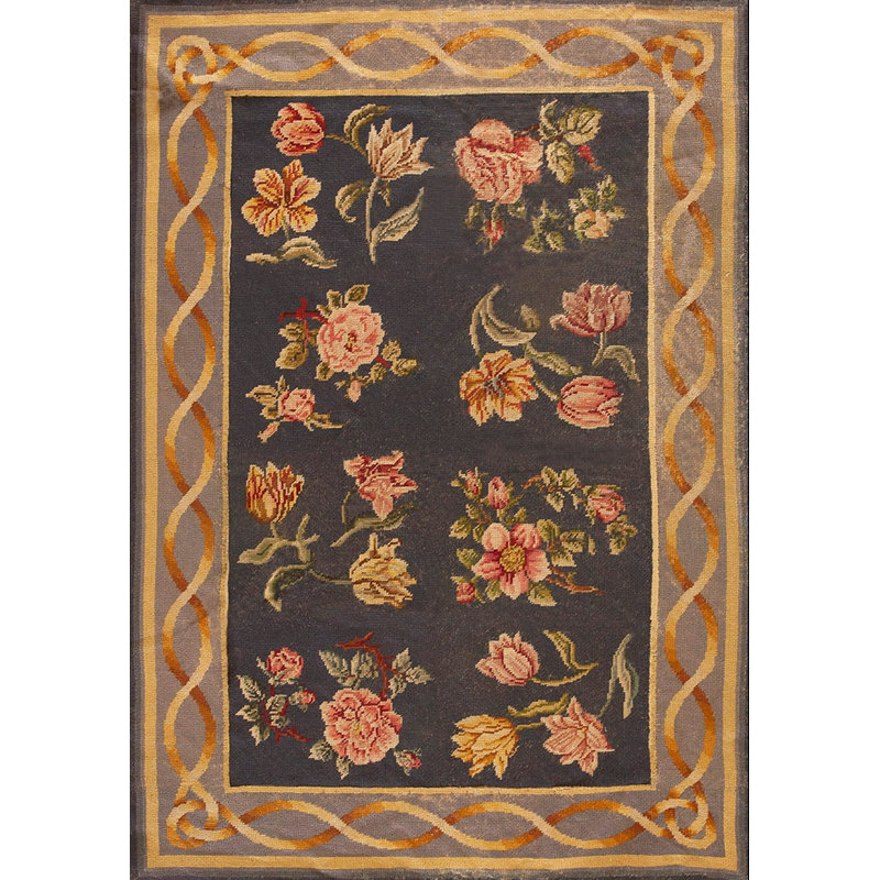 Tapis noué à motif floral antique