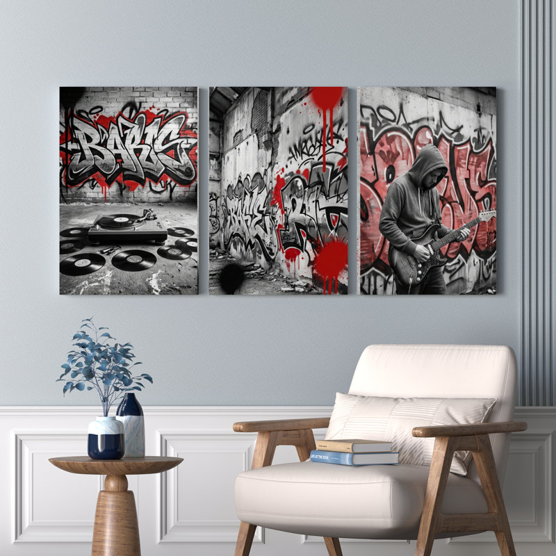 Ensemble de 3 tableaux muraux sur toile représentant des disques vinyles de musique graffiti et un guitariste