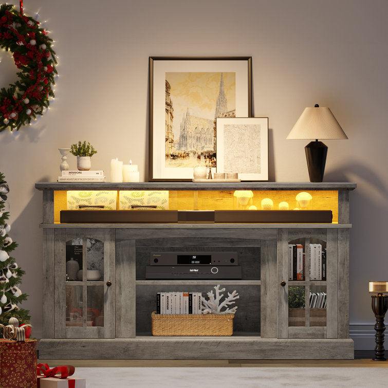 https://assets.wfcdn.com/im/26605400/resize-h755-w755%5Ecompr-r85/2636/263603647/Bostynn+TV+Stand+with+Tempered+Glass+Door+for+TVs+up+to+65%22+For+Living+Room.jpg