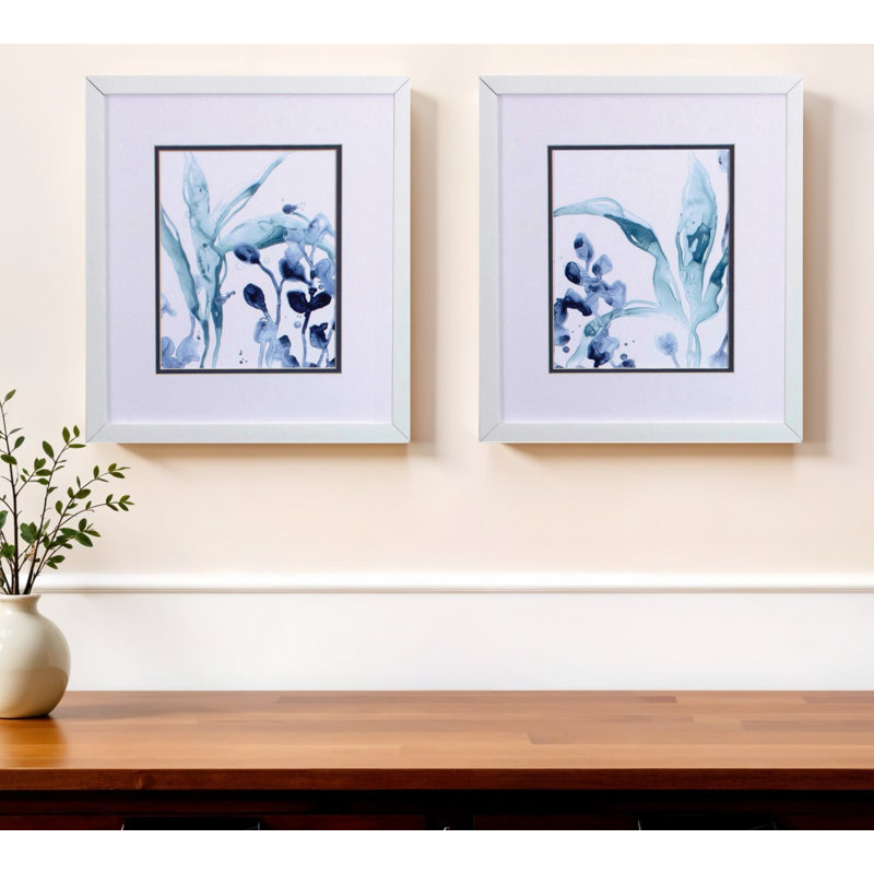 Ensemble de deux fleurs bleues encadrées