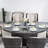 Emilie 6 - Person Patio Dining Set Oval Table with Cushions Included