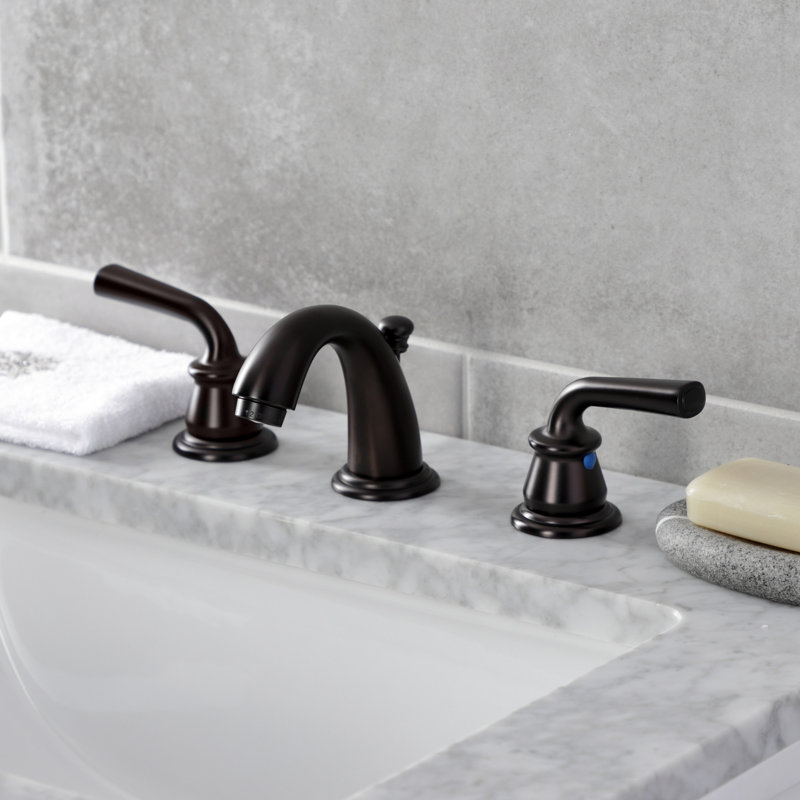 Kingston Brass Restoration Two-Handle 3-Hole Deck Mount Widespread Bathroom Faucet with Retail Pop-Up Drain