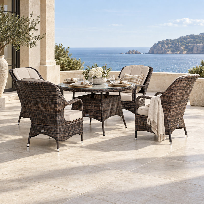 Batson 4 - Person Patio Dining Set Umbrella Hole Included Round Table with Cushions Included