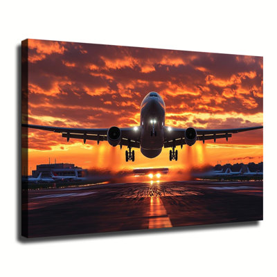 Atterrissage d'un avion de ligne sur une piste d'aéroport sous un coucher de soleil spectaculaire, grande toile tendue sur châssis pour salon ou chambre.