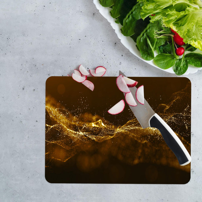 Planche à découper moderne en verre chatoyant doré idéale pour la préparation de la viande dans la cuisine à domicile