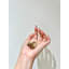 Forme ovale avec bouton rayé-122254364