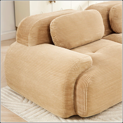 Canapé d'angle luxueux avec velours côtelé doux et coussins moelleux, parfait pour des sièges confortables et élégants