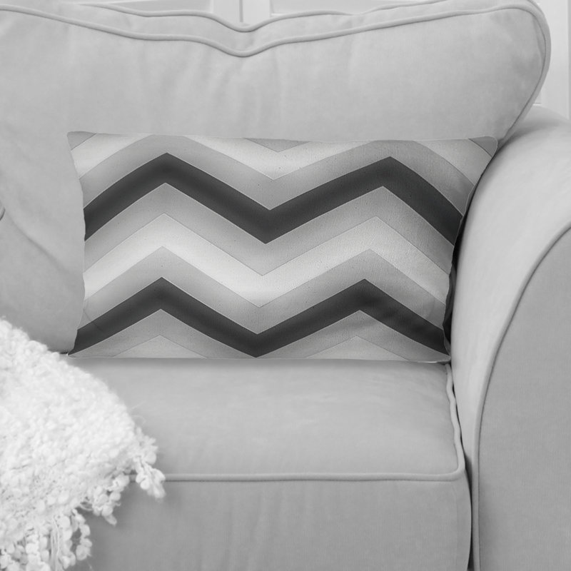 Coussin lombaire moderne à motif de chevrons noir et gris