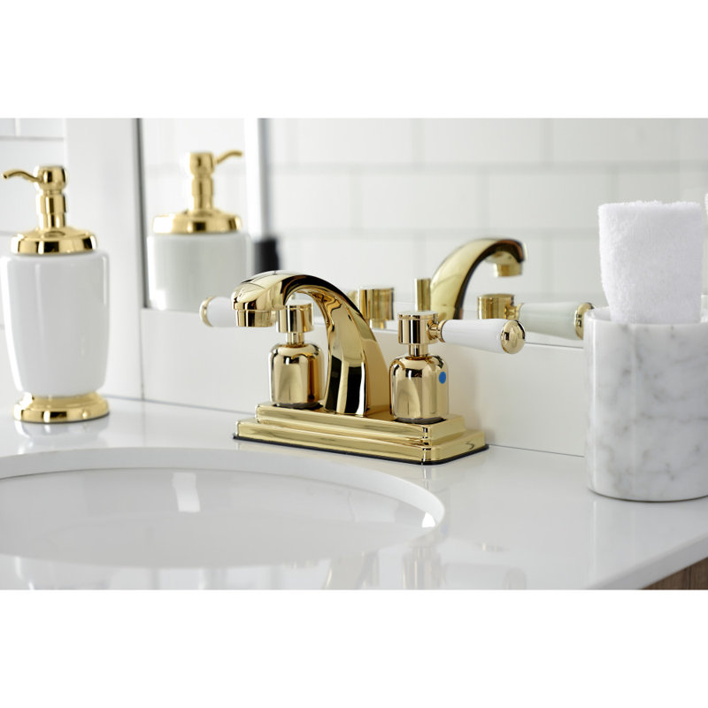 Kingston Brass Paris Two-Handle 3-Hole Deck Mount 4" Centerset Bathroom Faucet with Plastic Pop-Up, Polished Brass