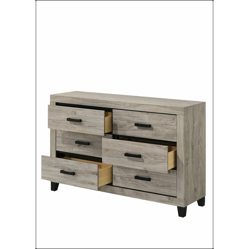 Commode à finition gris clair Mari avec six tiroirs spacieux, parfait pour les espaces modernes et traditionnels.