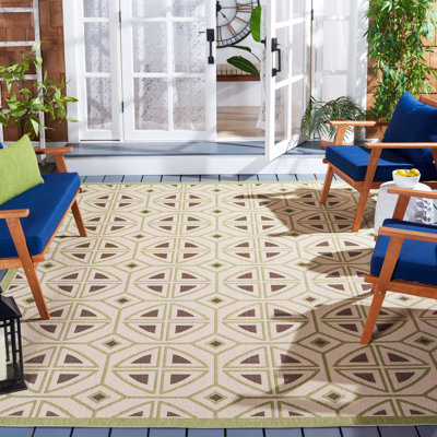 Tapis intérieur / extérieur vert / beige à motif géométrique Arneshia