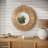 Kyzer Round Grass Wide Frame Boho Wall Mirror