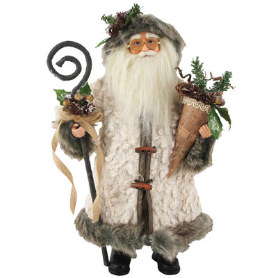 Figurine de père Noël bûcheron faisant la cueillette