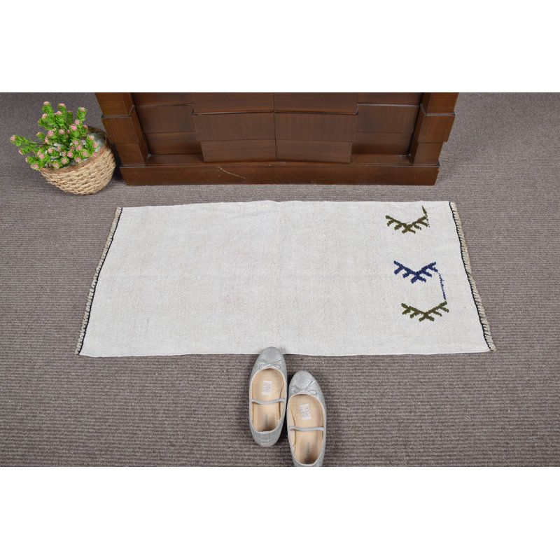 Vintage Turkish Door Mat Features Handwoven Design with Minimalist White and Arrow Motifs