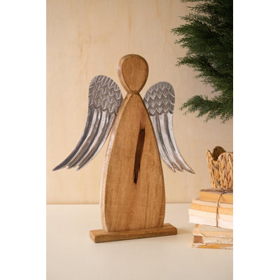 Ange sculpté en bois de manguier avec des ailes en aluminium