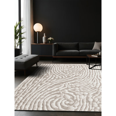 Tapis gris soyeux et moelleux