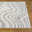 Tapis moderne à motif abstrait tourbillonnant-118392757
