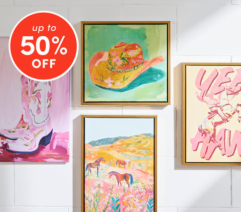 Wall decor up to 50% off featuring gallery wall with cowgirl-themed art and horse paintings