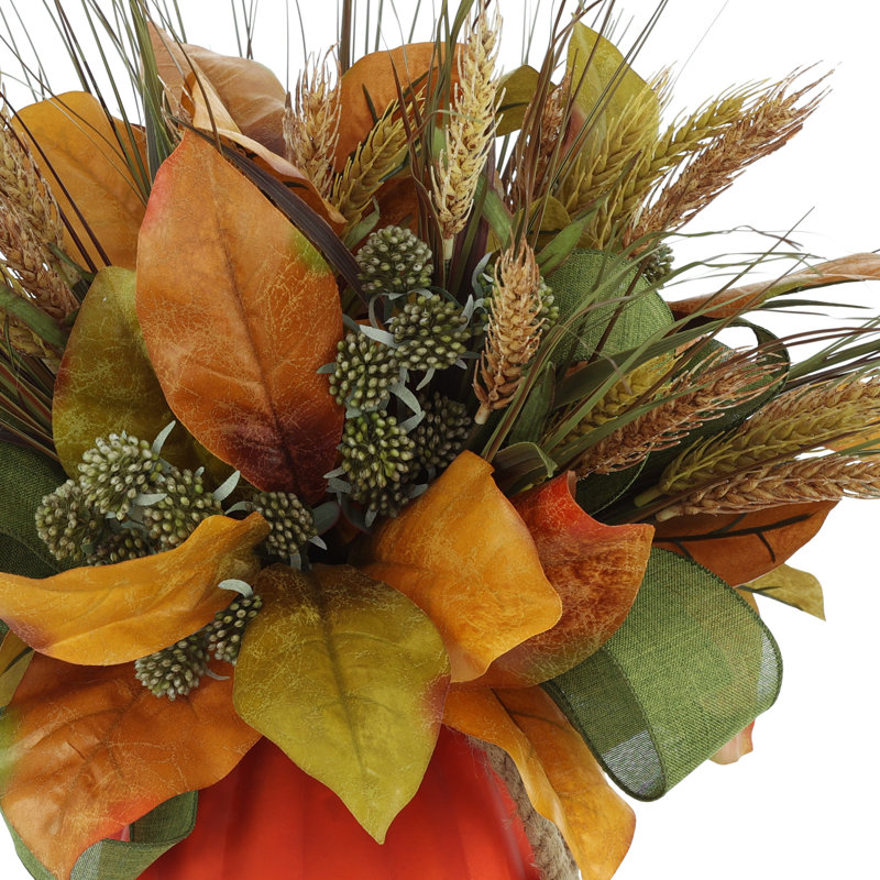 Magnolia Leaf and Wheat Arranged in Glass Pumpkin Pot