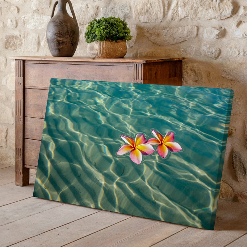 Toile une scène tropicale sereine avec deux fleurs de plumeria vibrantes, art mural flottant gracieusement sur la surface de l'art mural sur toile transparent