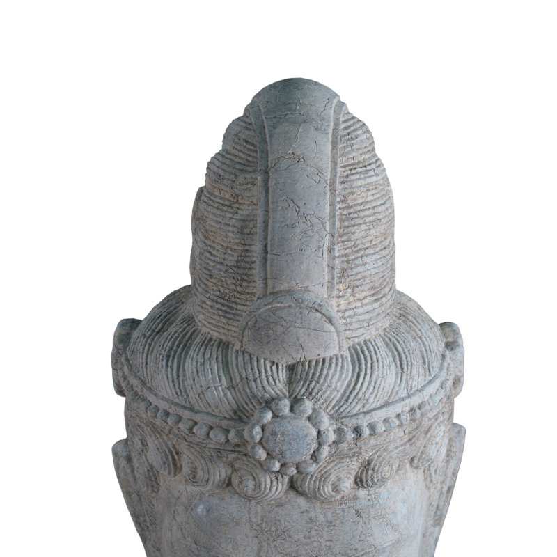 A Stone Statue Of Guanyin Head