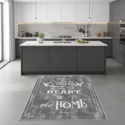 Tapis gris / blanc en polyester tissé à la machine