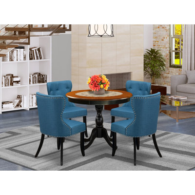L'ensemble de table de salle à manger 5 pièces comprend une table de salle à manger de style Mid-Century et 4 chaises de salle à manger modernes en lin bleu avec dossier capitonné - finition noire