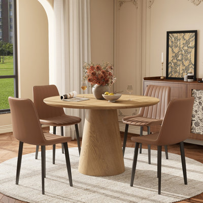 Ensemble de salle à manger rond avec chaises en similicuir